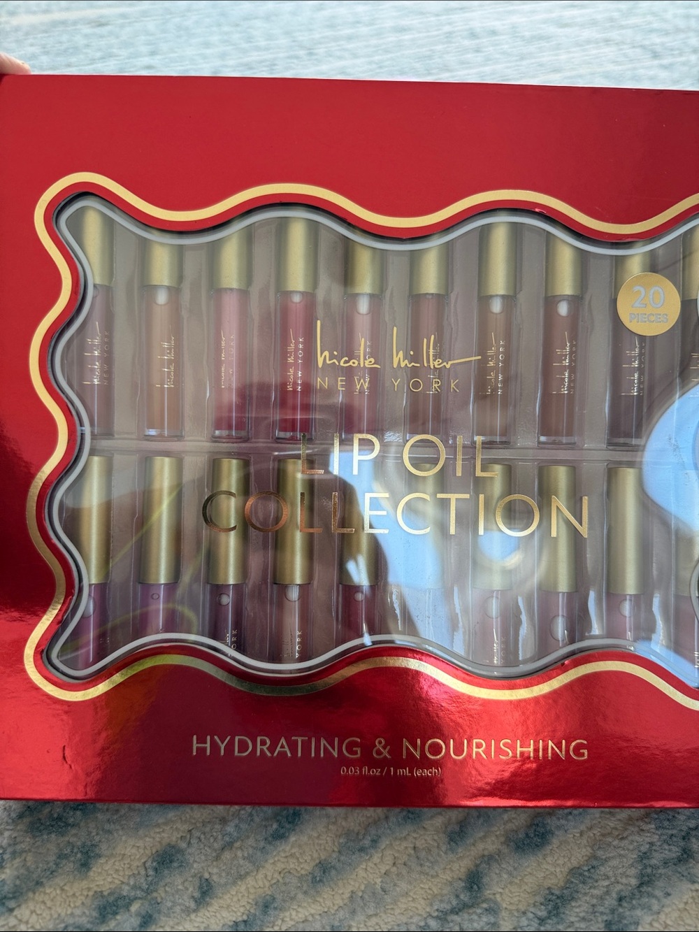 NIB 20-piece Nicole Miller Lip Oil Collection - Red Packaging with Gold Caps